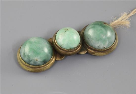 A Chinese gilt metal and jadeite mounted belt buckle, 19th century, 9cm long